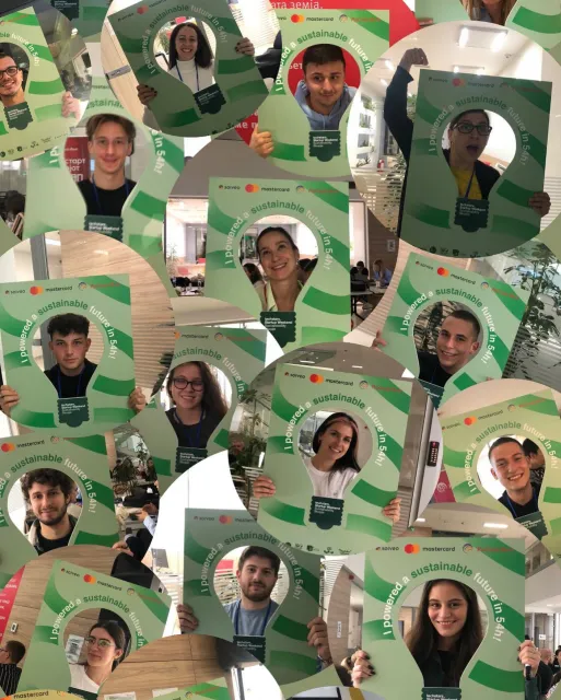 A collage of participants smiling through the light-bulb photo frame